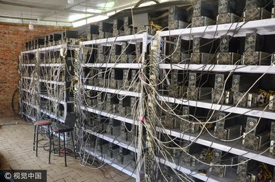 An aerial view of a sprawling mining farm, showcasing the infrastructure and scale of the operation.